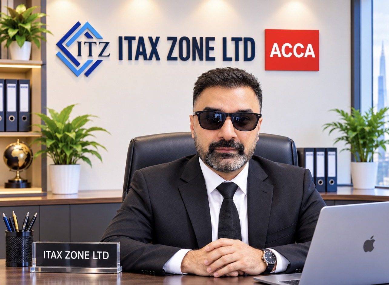 Muhammad Saqib Anait at his desk in the ITAX Zone office